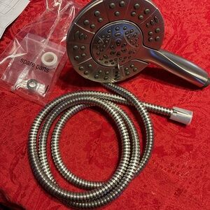 Delta In2ition 4-Spray Dual Showerhead and Handheld Showerhead.